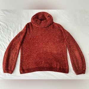 Burgundy turtleneck sweater. 
Woman’s/Juniors size: L